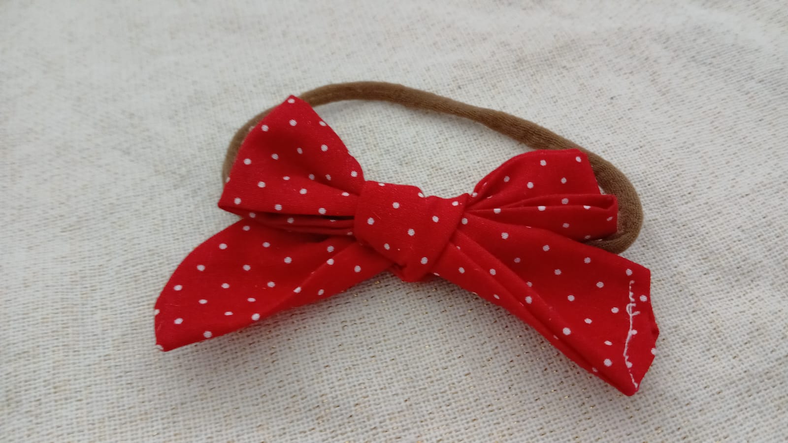 Haarband met rode strik en witte stippen