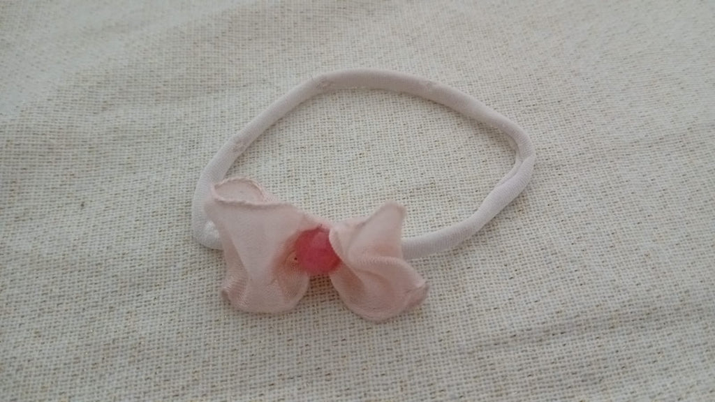 Haarband met roze strik