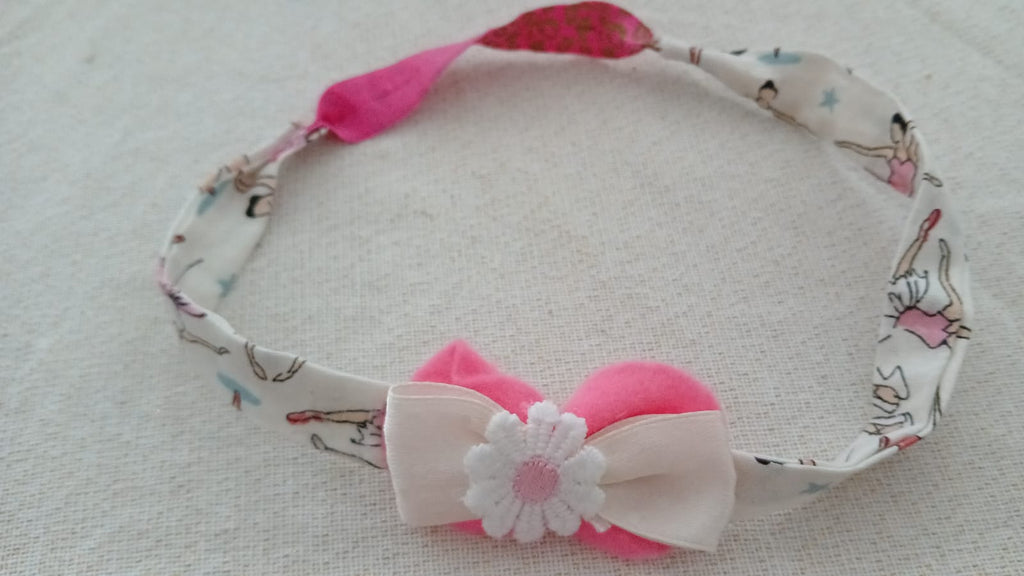 Haarband met fuchsia strik