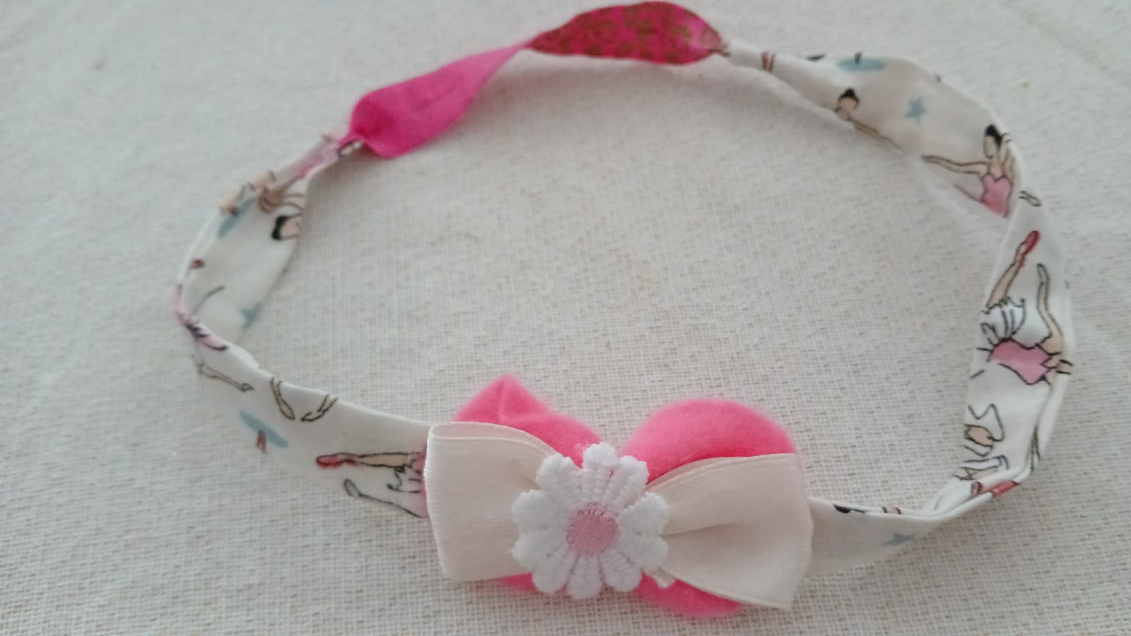 Haarband met fuchsia strik