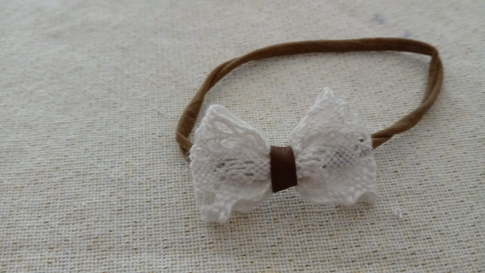 Haarband met witte geweven strik