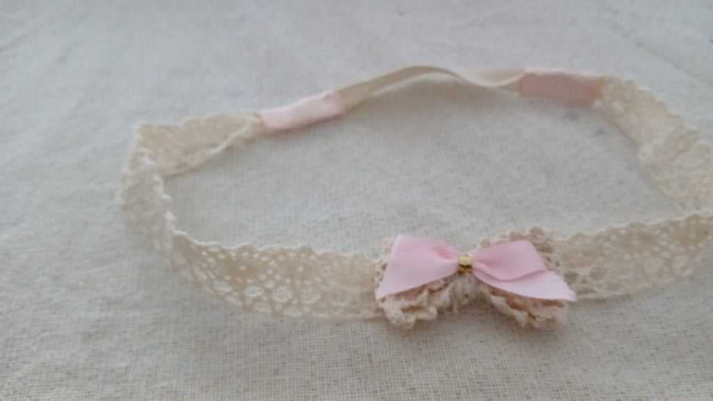 Haarband met roze strik