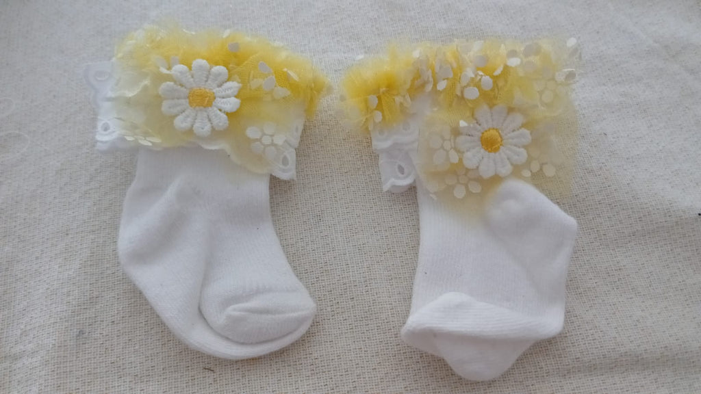 Set slipjes met gele tule en madeliefjes