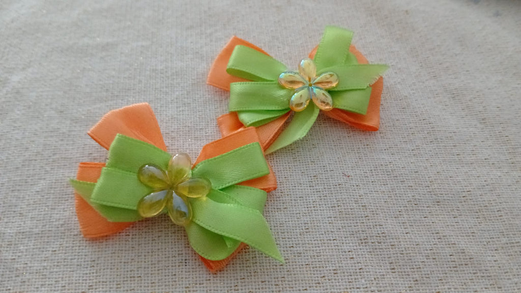 Groene en oranje lintlus