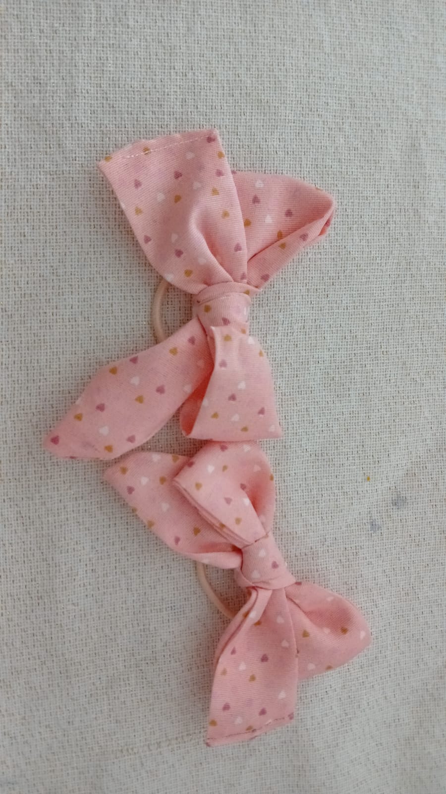 Roze strikjes in staartjes voor meisjes