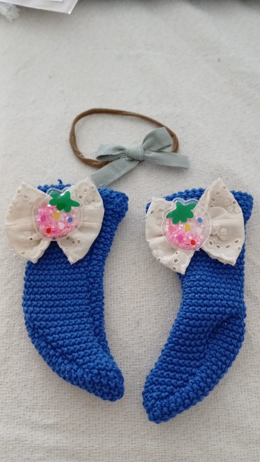 Set van blauwe gebreide maillot met hoofdband