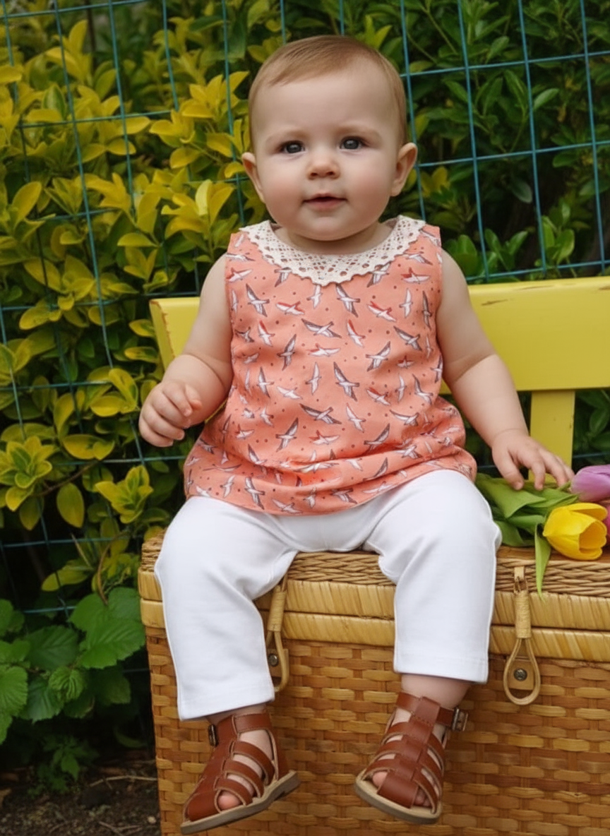 Oranje jurk met meeuwen