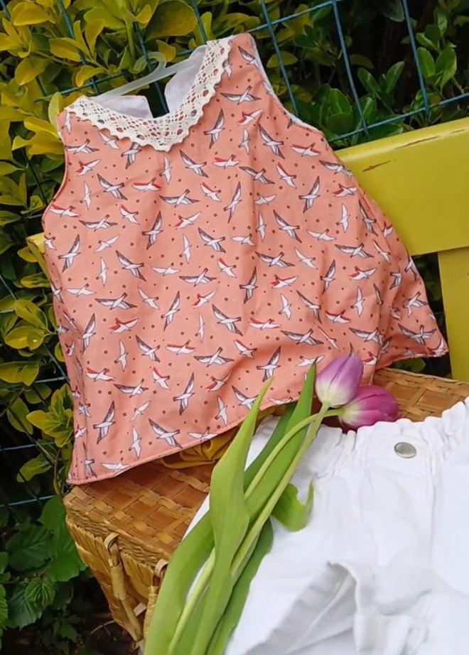 Oranje jurk met meeuwen